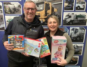 Andy Mason from GK&N Services and Lucy Bailey from Environmental Defence Services with some of the toys